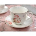 Чашка и блюдце нежно розового цвета
